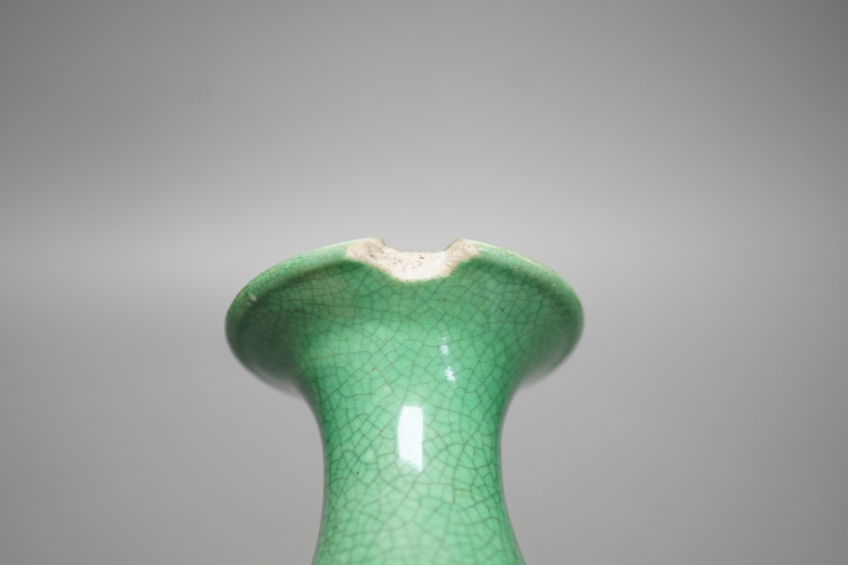 An early 20th century Chinese green crackle glazed vase (a.f.). 17cm.